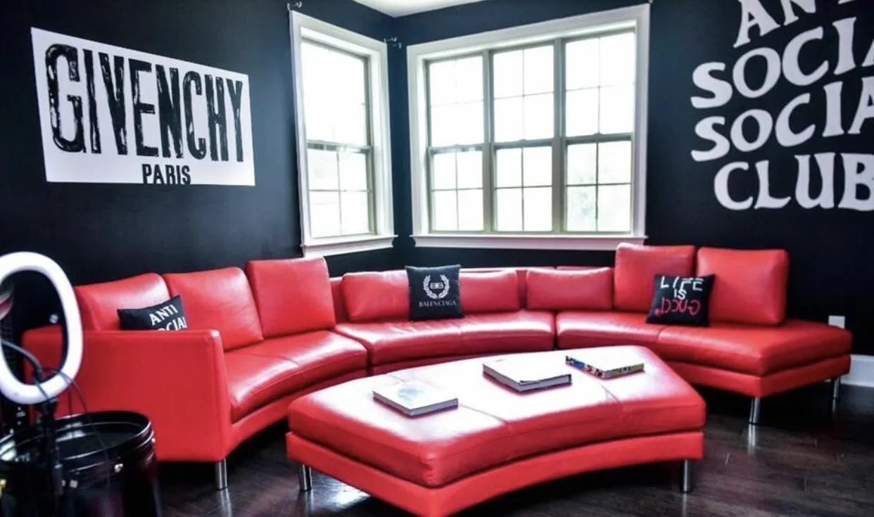 Bold red lounge with graphic black-and-white wall art